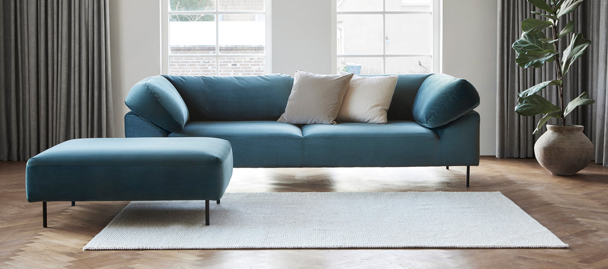 Collar Sofa by Woud, showing collar sofa in live shot.
