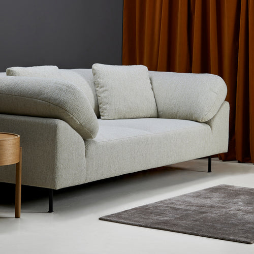 Collar Sofa by Woud, showing collar sofa in live shot.