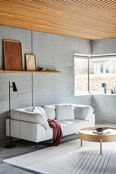 Collar Sofa by Woud, showing collar sofa in live shot.