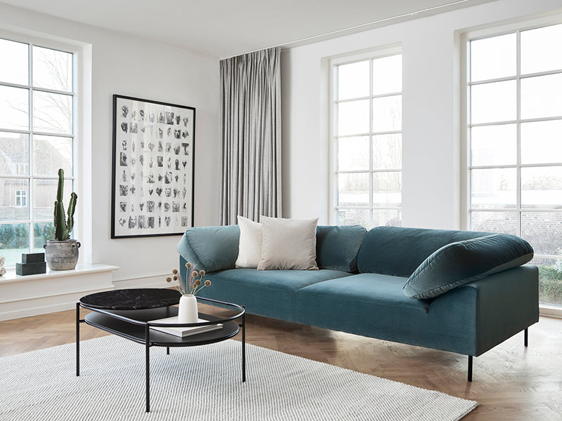 Collar Sofa by Woud, showing collar sofa in live shot.