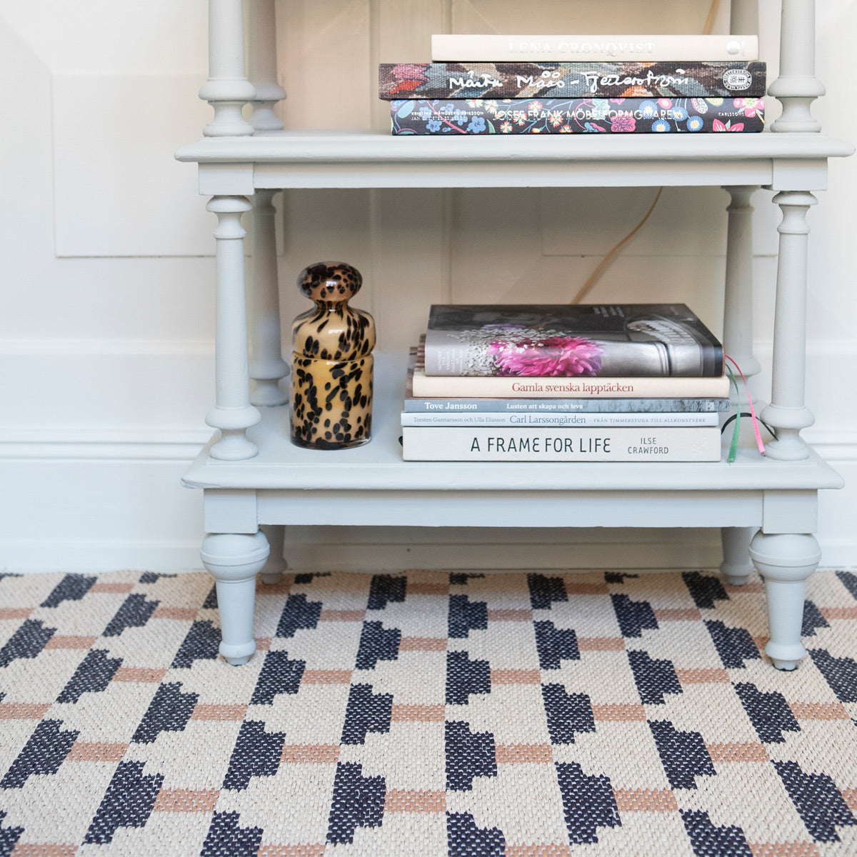 Confect Woven Plastic Rug by Brita, showing closeup view of confect woven plastic rug in live shot.