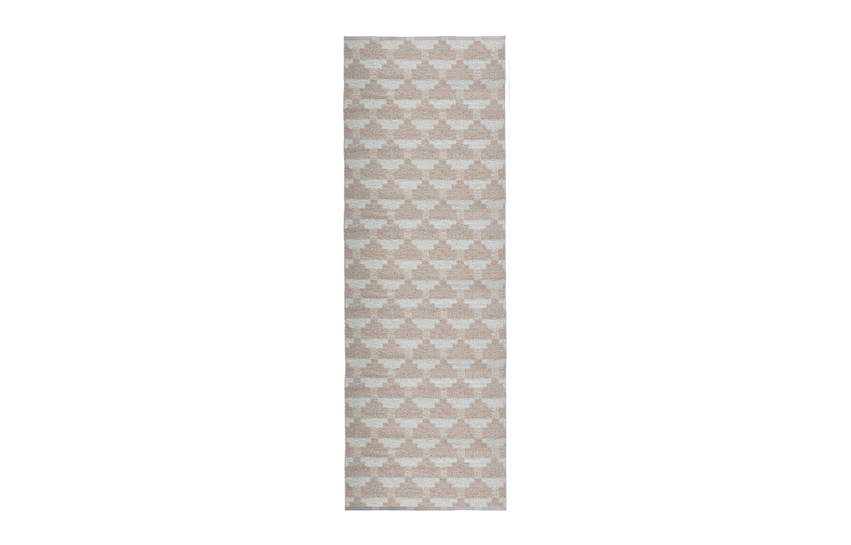 Confect Woven Plastic Rug by Brita - Vanilla Confect Woven Rug.