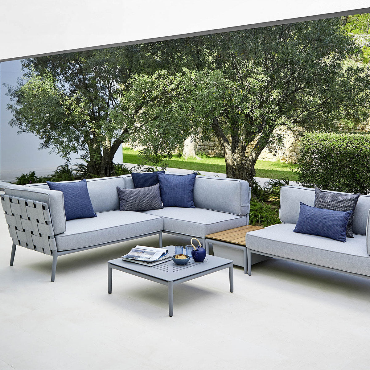 Conic Outdoor Module by Cane-Line, showing conic outdoor modules in live shot.