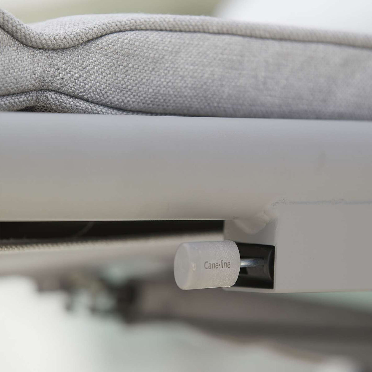 Conic Sunbed with Gas Spring by Cane-Line, showing closeup view of conic sunbed with gas spring in live shot.