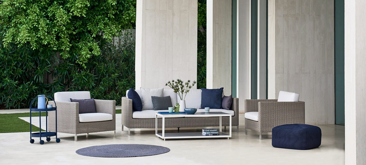 Connect Lounge Chair by Cane-Line, showing connect lounge chairs in live shot.