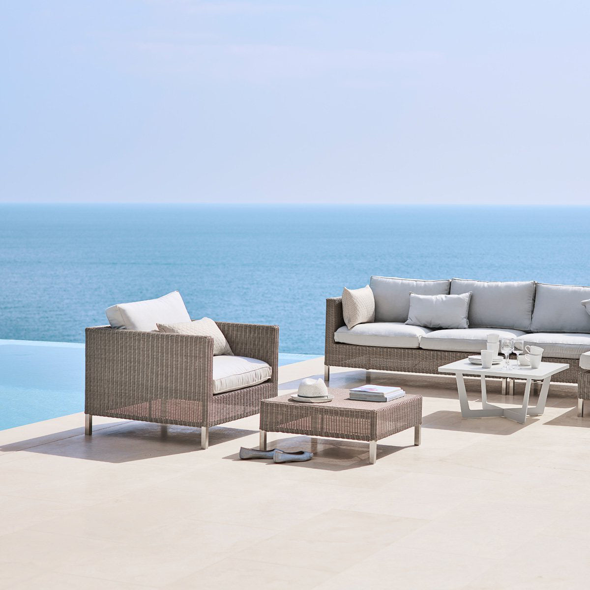 Connect Lounge Chair by Cane-Line, showing connect lounge chair in live shot.