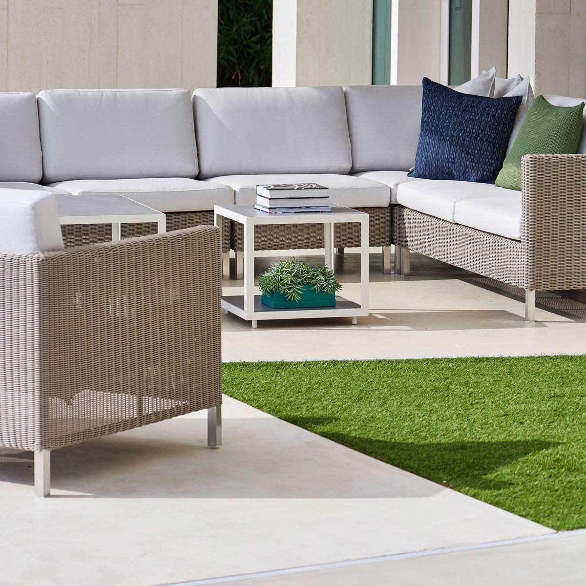 Connect Lounge Chair by Cane-Line, showing connect lounge chair in live shot.