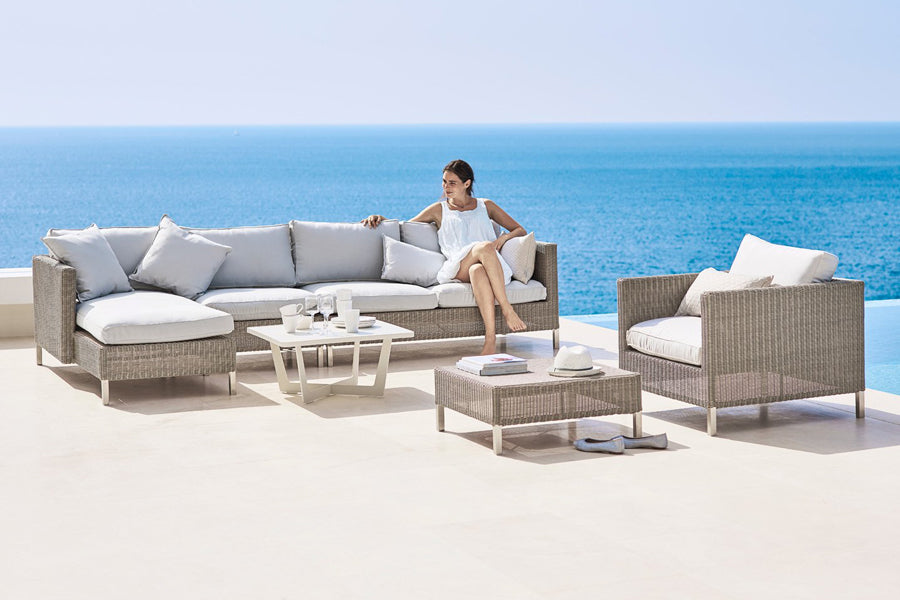 Connect Lounge Chair by Cane-Line, showing connect lounge chair in live shot.