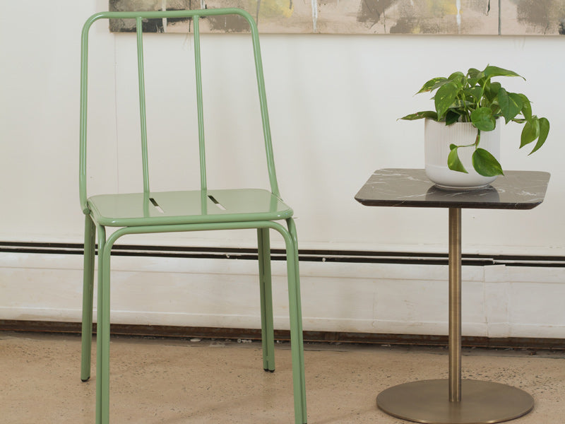 Conti Chair by Kollektiff, showing of conti chair with table in live shot.