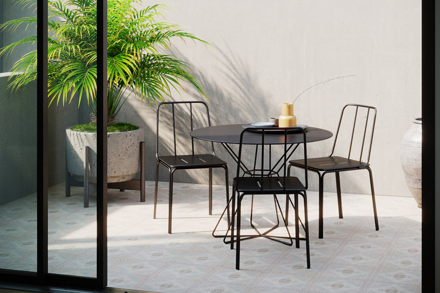 Conti Chair by Kollektiff, showing of conti chair with table in live shot.