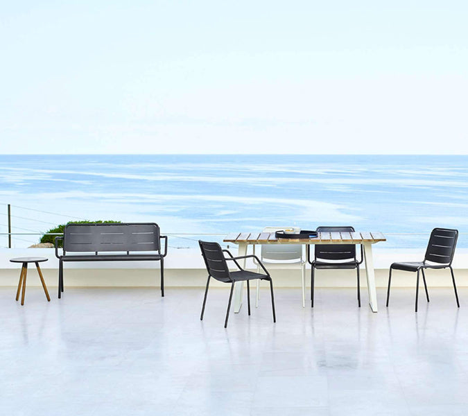 Copenhagen Dining Table w/ Extension by Cane-Line, showing dining table with chairs in live shot.
