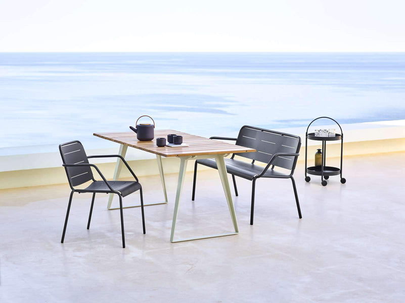 Copenhagen Dining Table w/ Extension by Cane-Line, showing dining table with chairs in live shot.