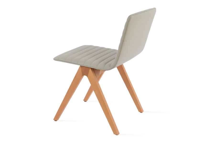 Corona Fino Full Upholstery Dining Chair by SohoConcept, showing back view in light grey leatherette with natural finish.