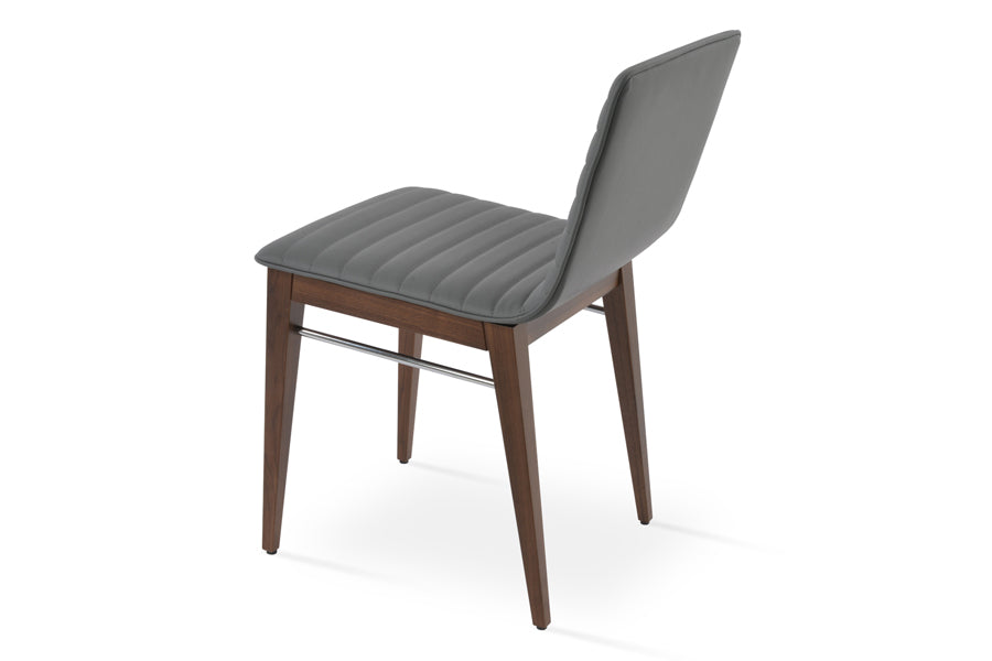 Corona Full Upholstery Wood Dining Chair by SohoConcept, showing back view of chair in grey leatherette with american walnut wood.