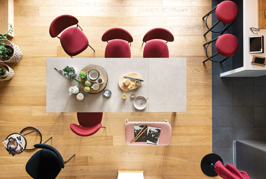 Cozy Chair by Connubia, showing cozy chairs with table in live shot.