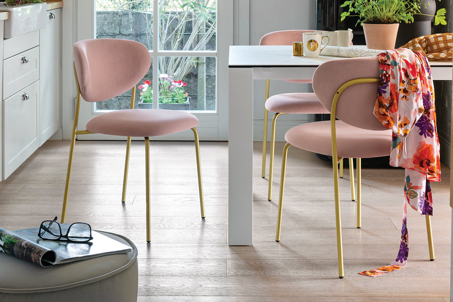 Cozy Chair by Connubia, showing cozy chairs with table in live shot.
