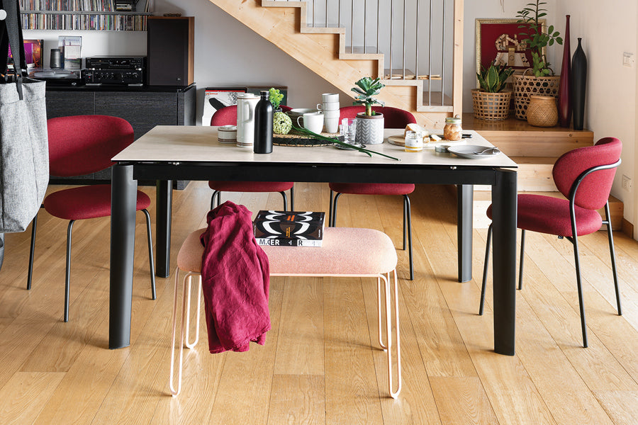 Cozy Chair by Connubia, showing cozy chairs with table in live shot.