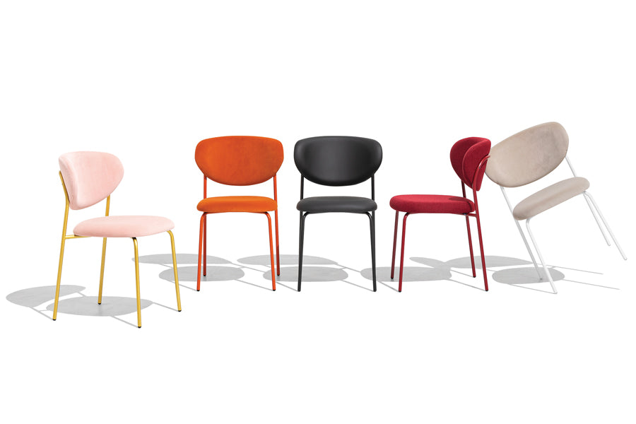 Cozy Chair by Connubia, showing different angles of cozy chairs with table in different colors.