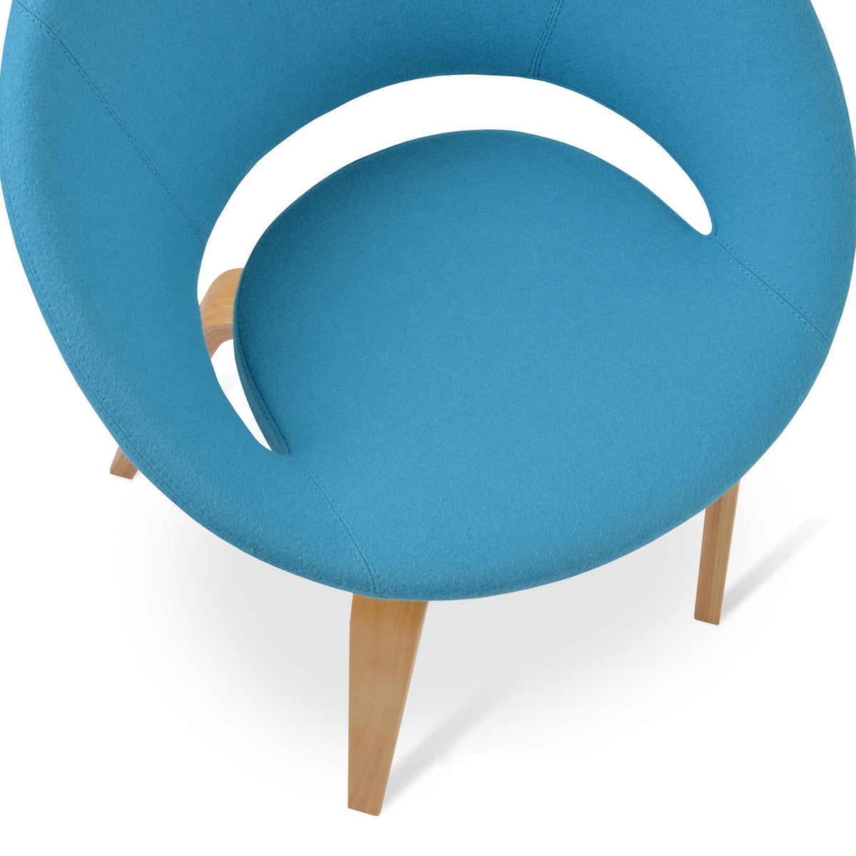 Crescent Plywood Dining Chair by SohoConcept, showing closeup view of crescent plywood dining chair in camira blazer turquoise wool with natural finish.