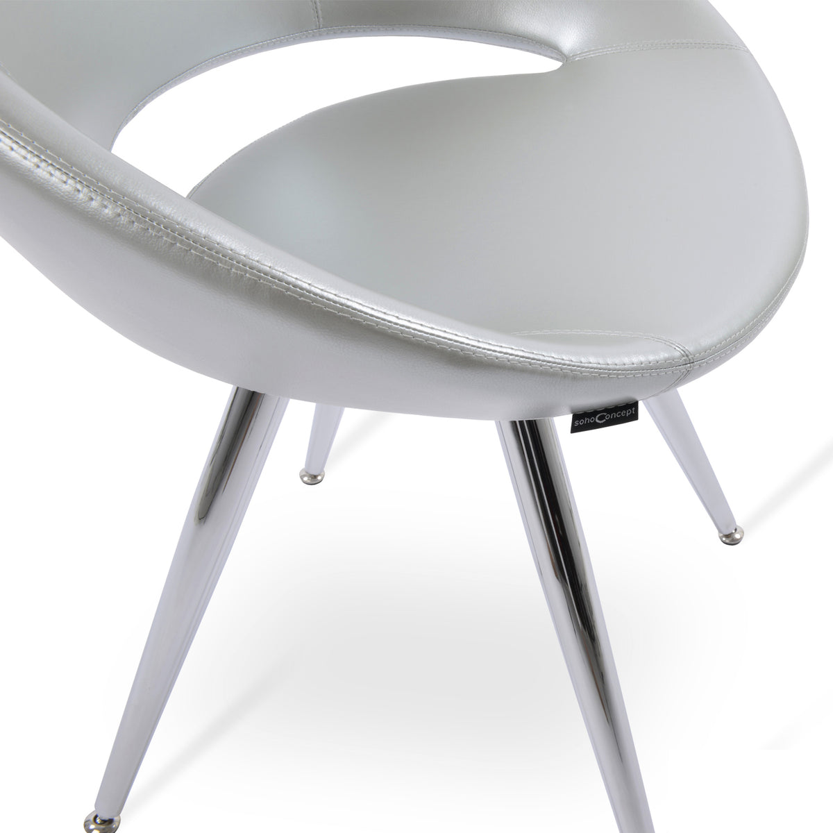 Crescent Star Chair by SohoConcept, showing closeup view in silver ppm with stainless steel base.