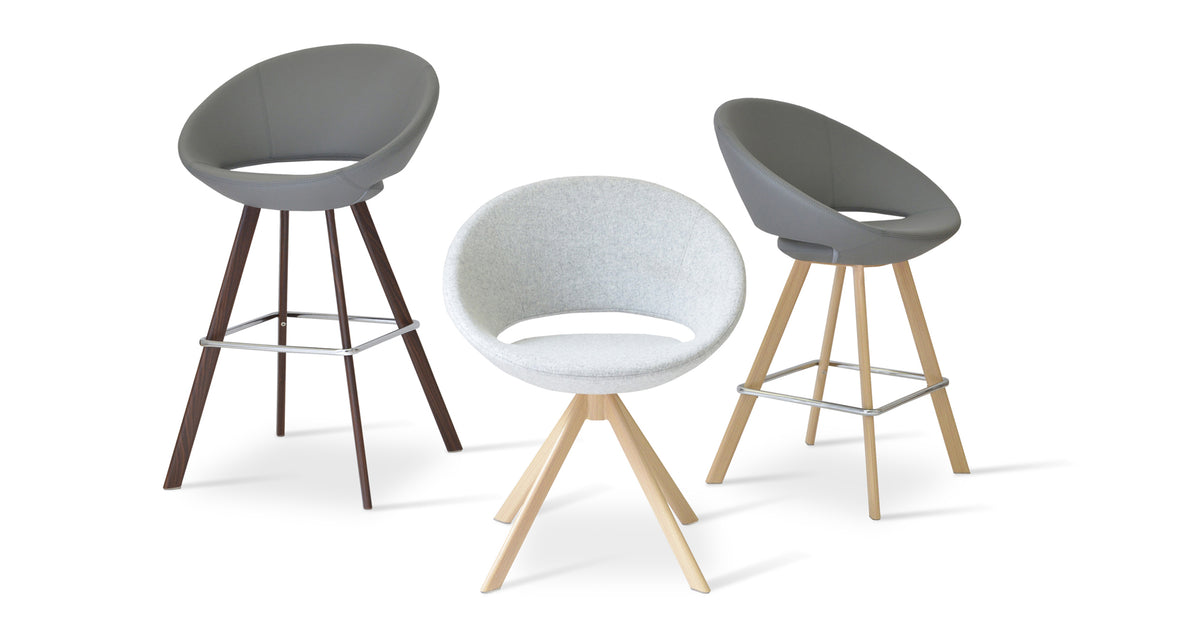 Crescent Sword Dining Chair by SohoConcept, showing group of chairs in camira blazer silver wool & grey ppm colors with walnut & natural veneer steel bases.