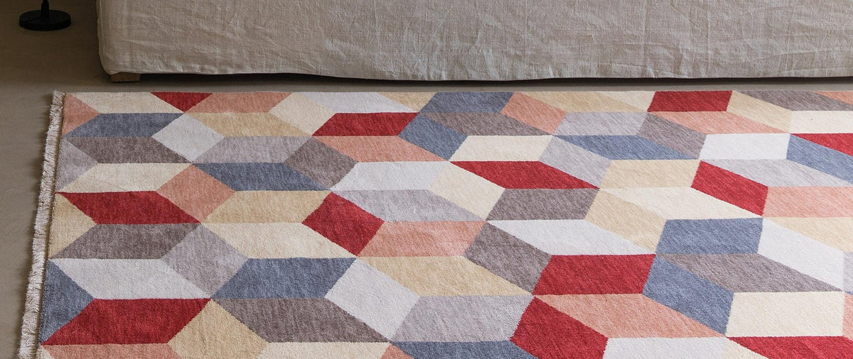 Cube 045.069.990 Cross Woven Rug by Ligne Pure, showing cube 045.069.990 cross woven rug in live shot.
