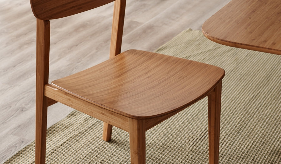 Currant Dining Chair by Greenington, showing currant chairs in live shot.