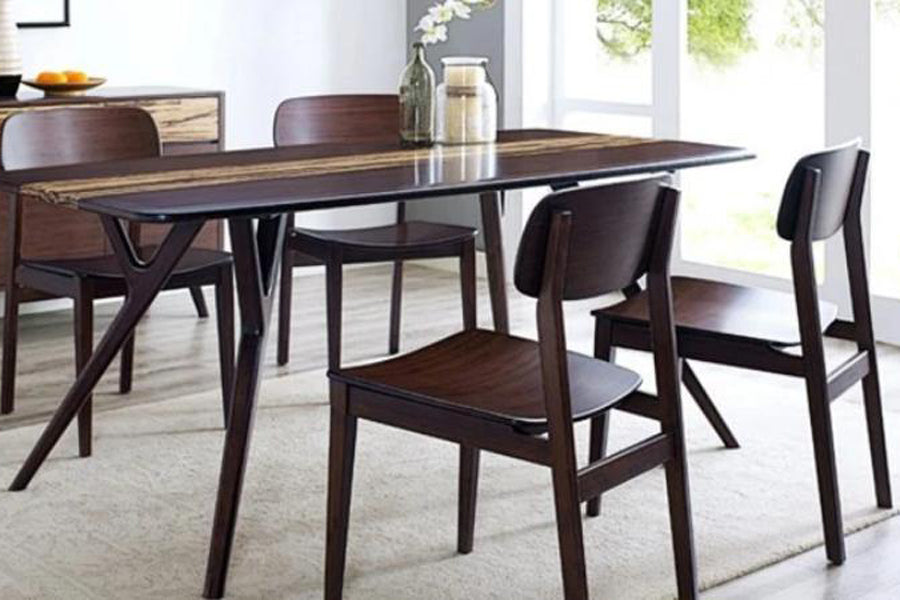 Currant Dining Chair by Greenington, showing currant chairs with table in live shot.