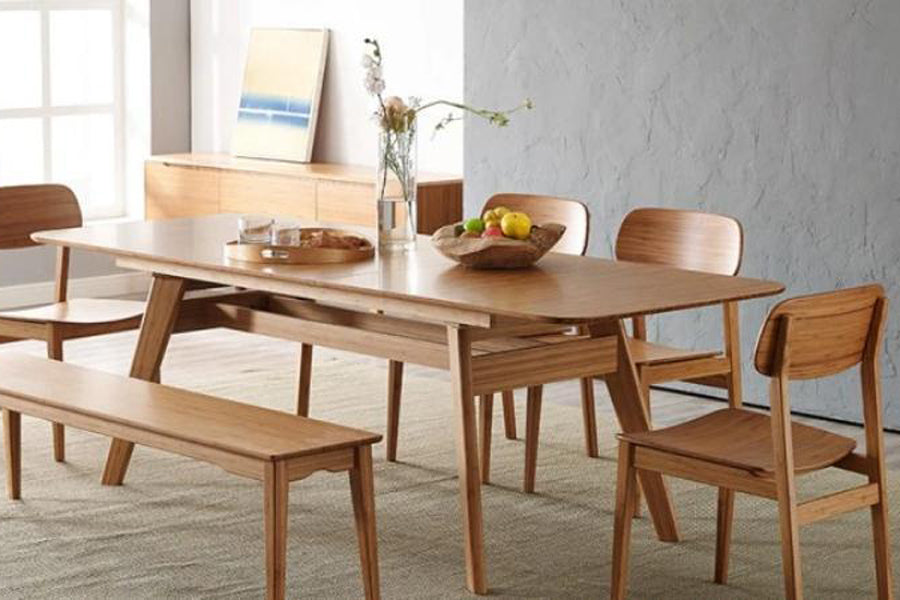 Currant Dining Chair by Greenington, showing currant chairs with table in live shot.