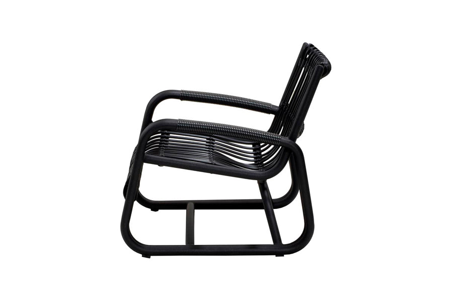 Curve Outdoor Lounge Chair by Cane-line, showing side view of curve outdoor lounge chair in lava grey aluminum frame/weave.