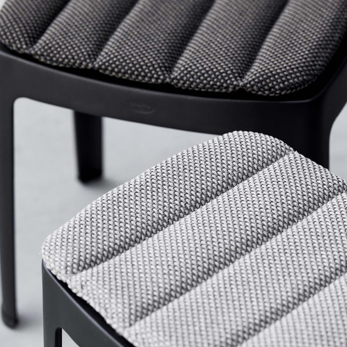 Cut Stool by Cane-Line, showing closeup view of cut stools in live shot.