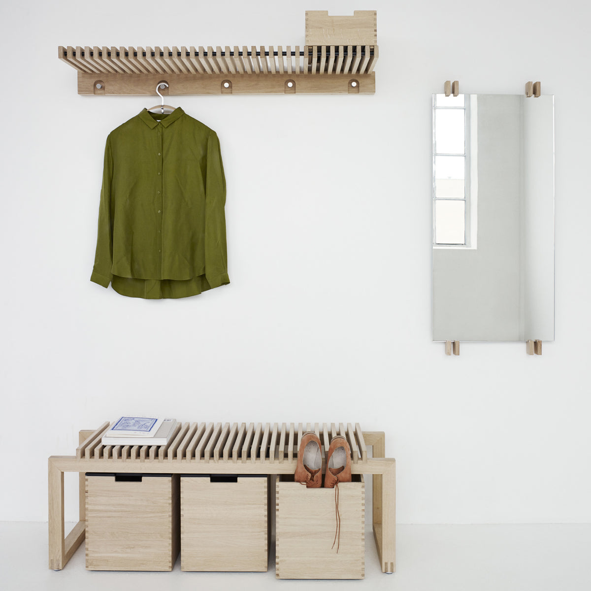 Cutter Mirror by Skagerak, showing cutter mirror with cutter bench & cutter boxes in live shot.
