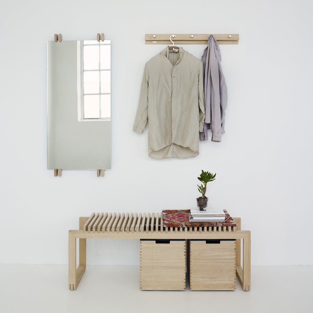 Cutter Mirror by Skagerak, showing cutter mirror with cutter bench & cutter boxes in live shot.