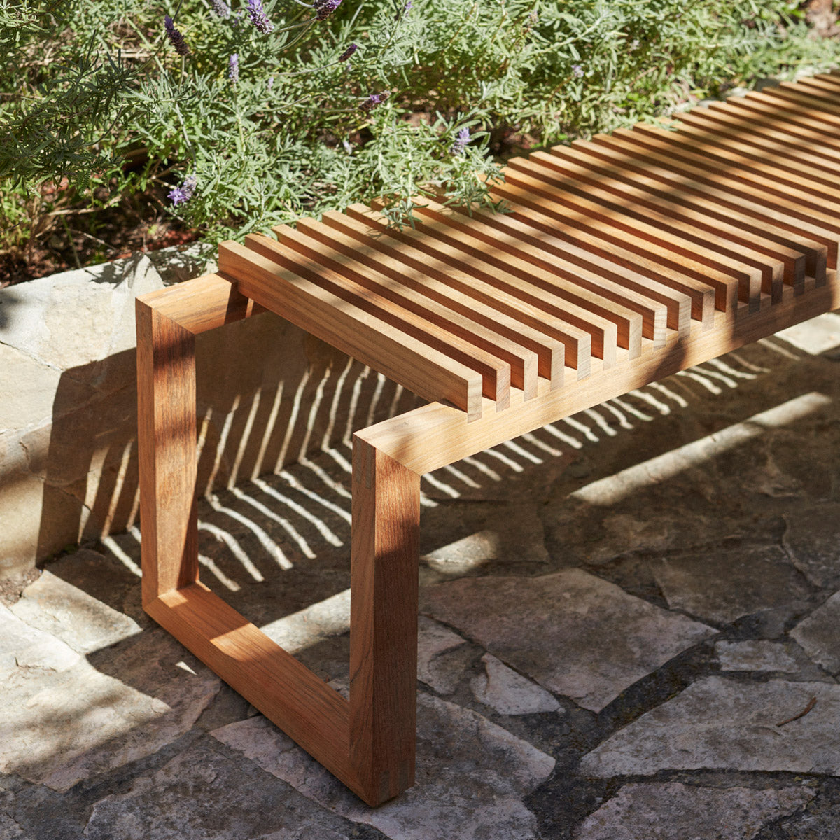 Cutter Outdoor Bench by Skagerak, showing closeup view of cutter outdoor bench in live shot.