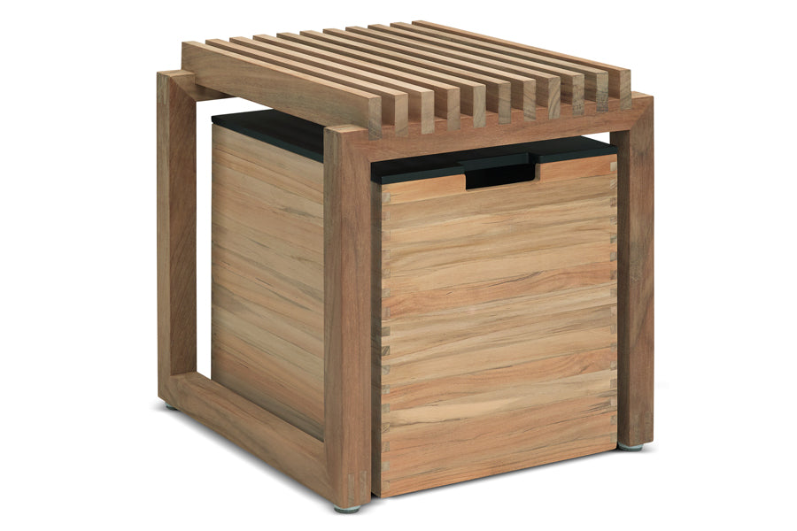 Cutter Stool by Skagerak, showing angle view of cutter stool with cutter box in teak wood.