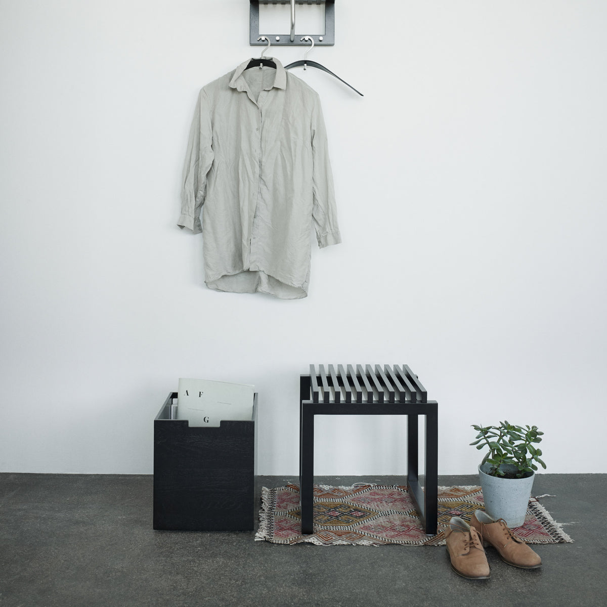 Cutter Stool by Skagerak, showing cutter stool with cutter box in live shot.