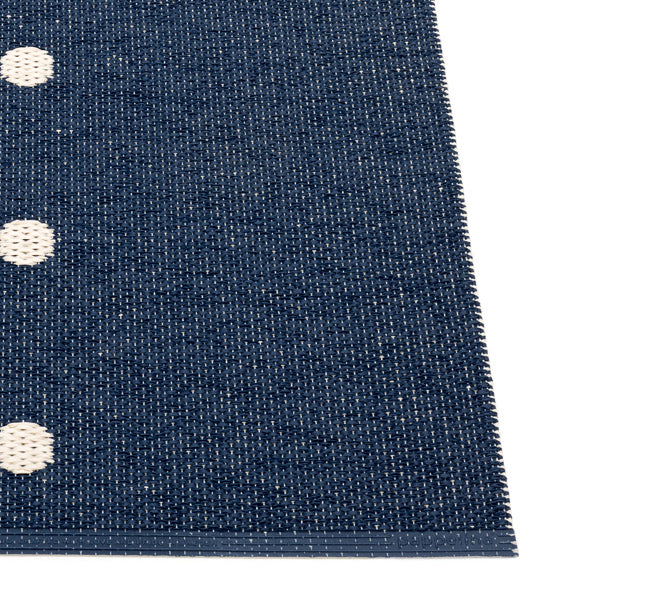 Peg Dark Blue & Linen Runner Rug by Pappelina, showing closeup view of peg dark blue & linen runner rug.