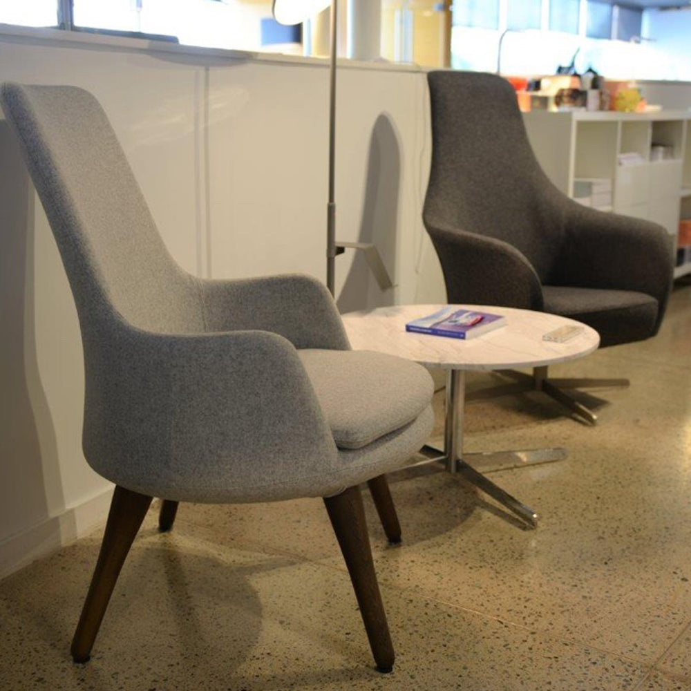Dervish 4 Star Lounge Arm Chair by SohoConcept, showing dervish 4 star lounge arm chairs in live shot.