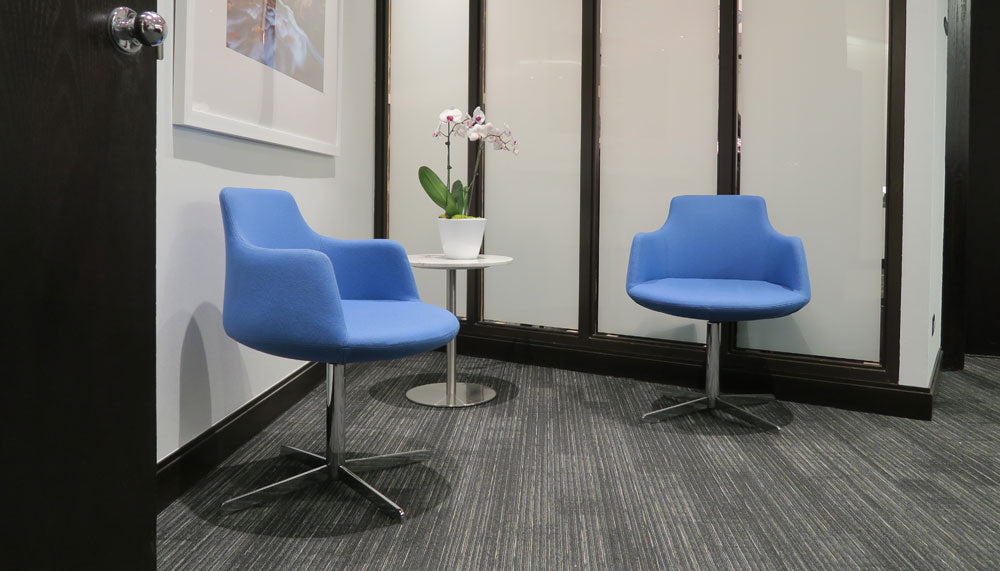 Dervish 4 Star Swivel Chair by SohoConcept, showing two chairs in camira blazer skyblue wool in live shoot.