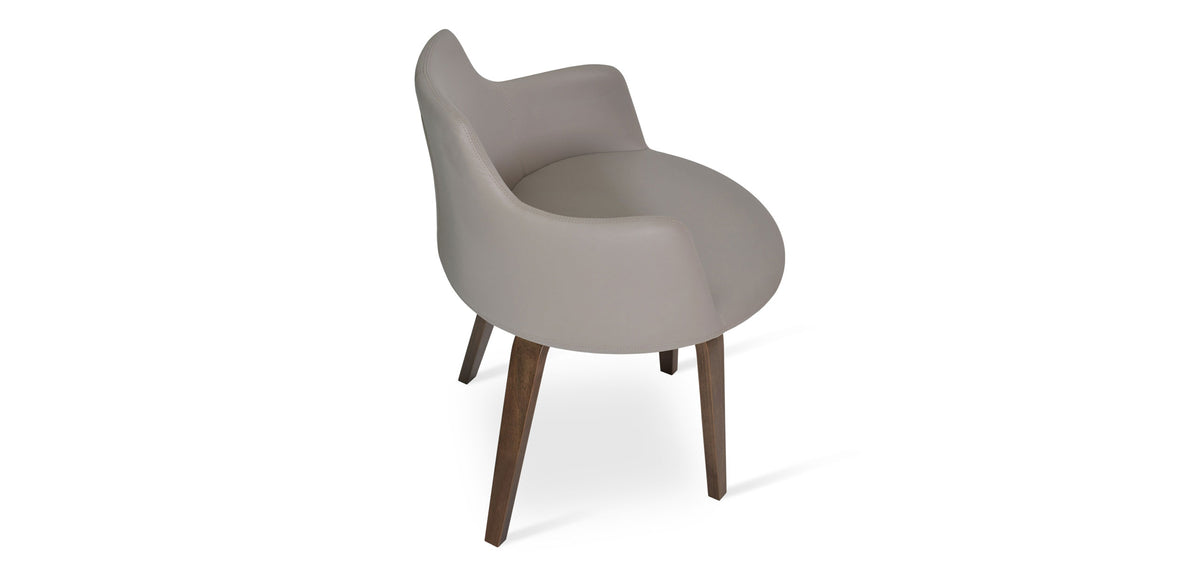 Dervish Plywood Chair by SohoConcept, showing angle view in bone leatherette with american walnut veneer base.