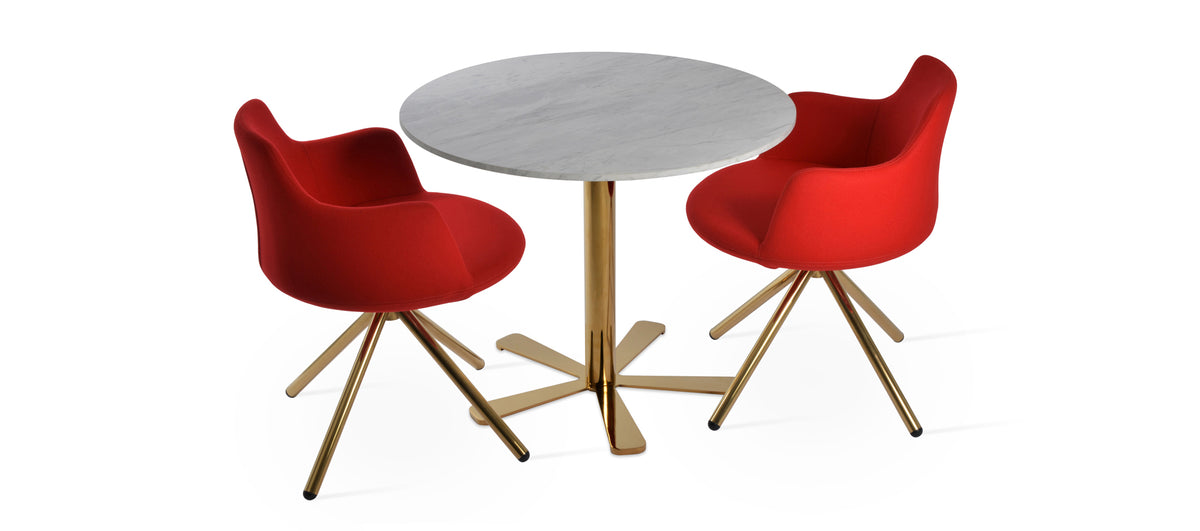 Dervish Stick Swivel Chair by SohoConcept, showing two chairs in camira blazer candy apple red wool with gold (brass) base and daisy bar table with gold (brass) base.