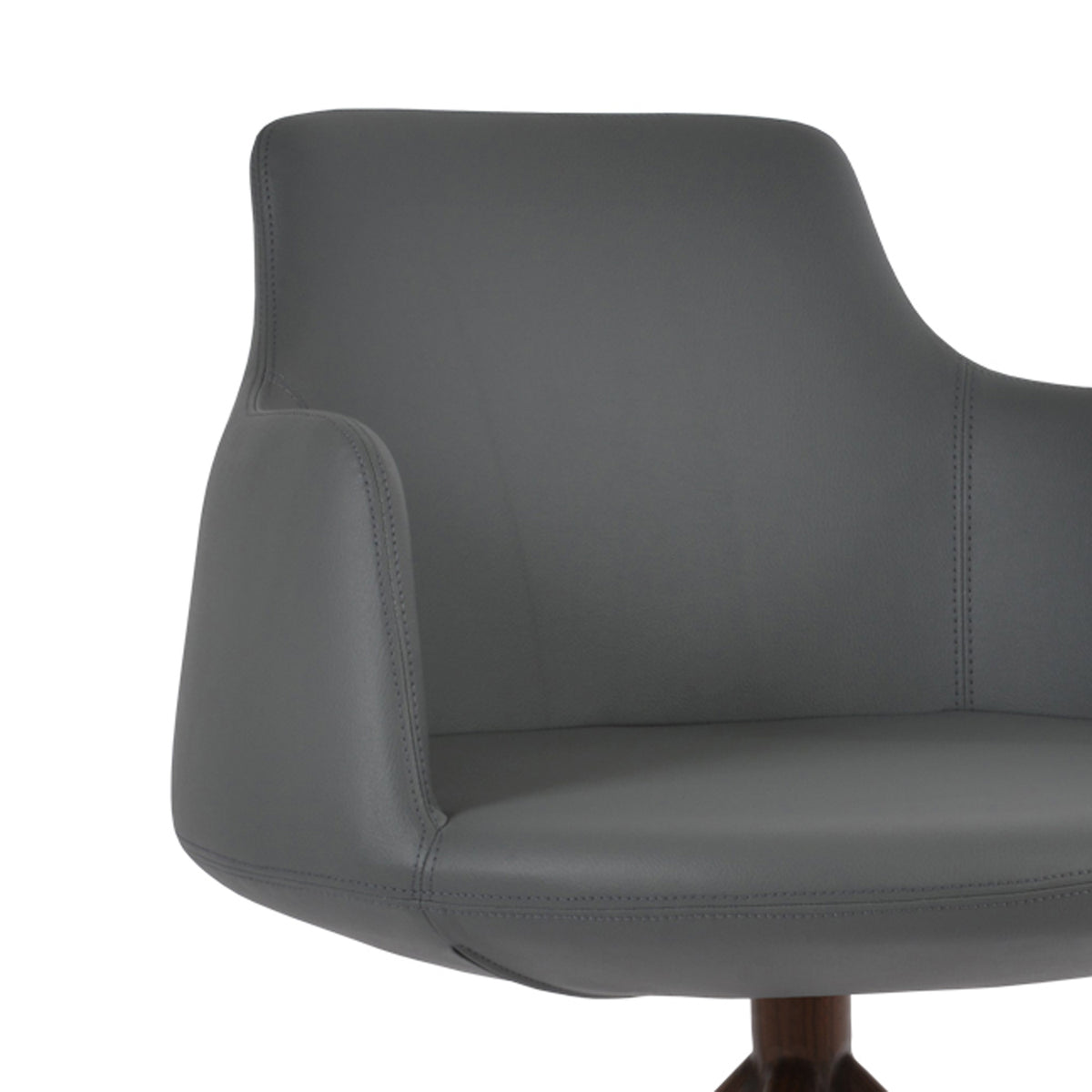 Dervish Stick Swivel Chair by SohoConcept, showing closeup view of stick swivel chair.