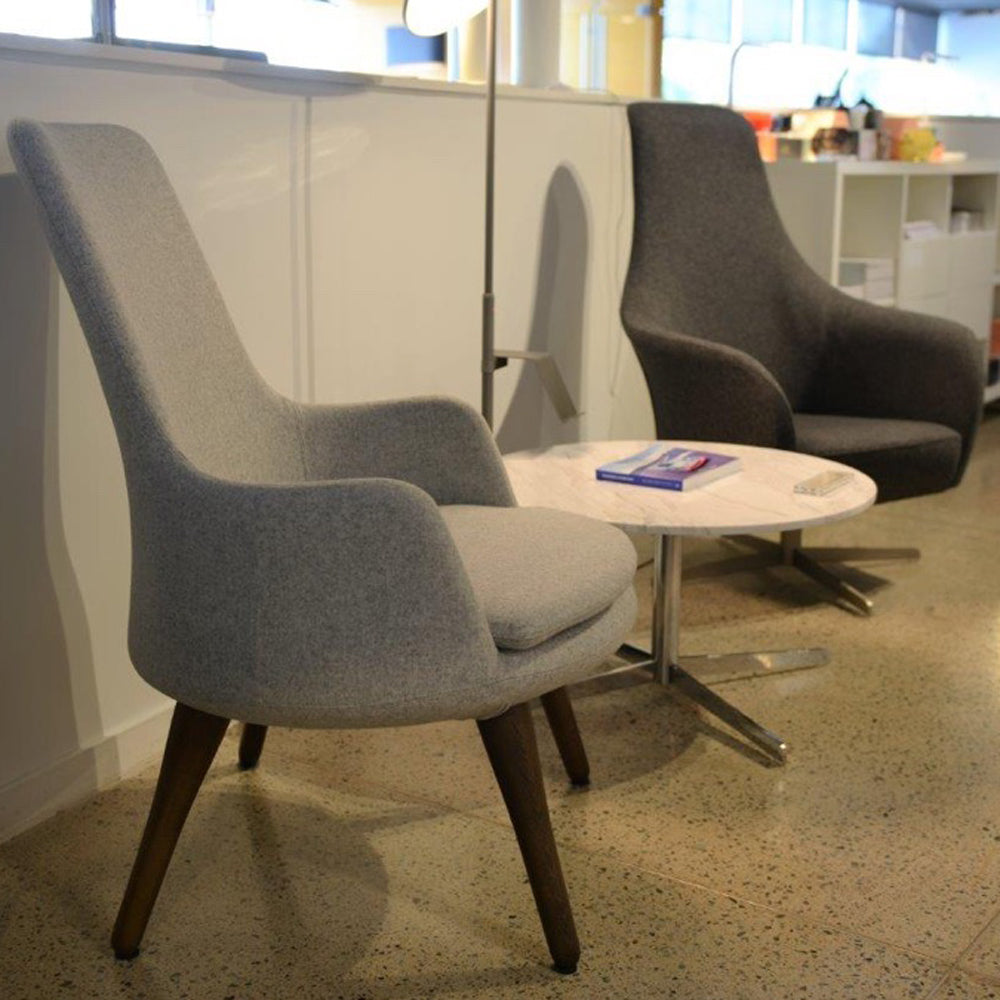 Dervish Wood Lounge Arm Chair by Sohoconcept, showing angle view of dervish wood lounge arm chair in live shot.