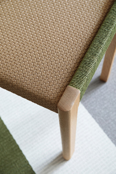 Detalji Bench by Nikari, showing closeup view of detalji bench in live shot.