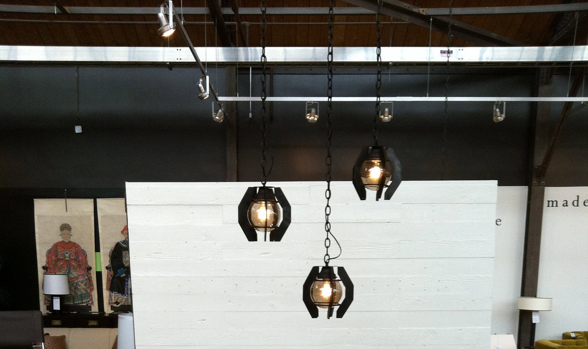 James De Wulf Ball Pendant by De Wulf, shown in forge blackened steel.