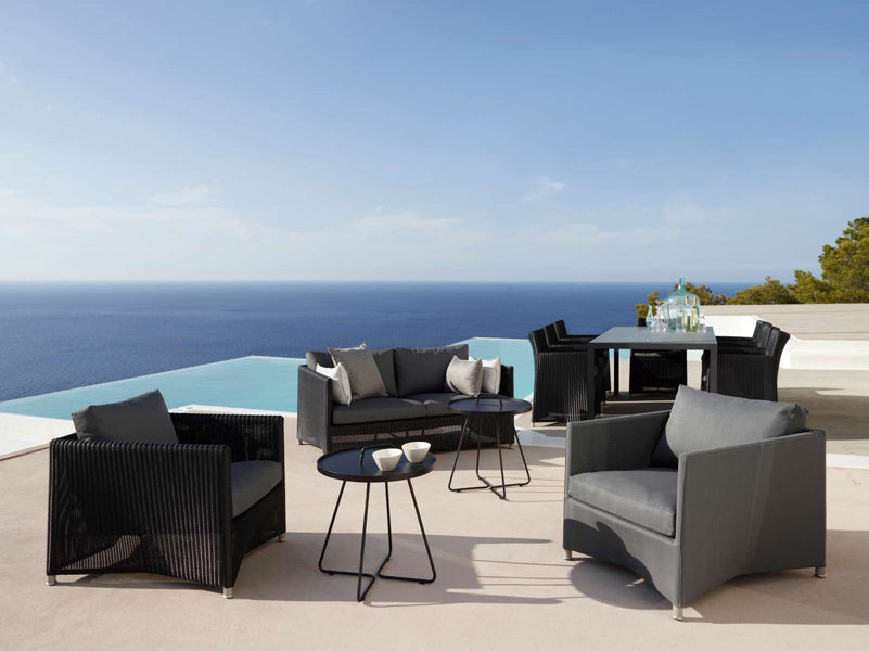 Diamond Outdoor Sofa by Cane-Line, showing diamond outdoor sofa in live shot.