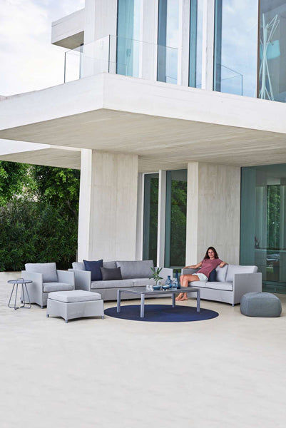 Diamond Outdoor Footstool by Cane-Line, showing diamond outdoor footstool in live shot.