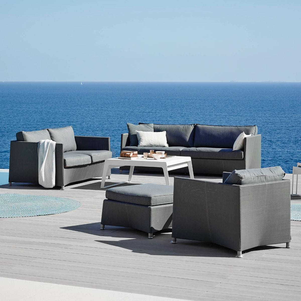 Diamond Outdoor Lounge Chair by Cane-Line, showing diamond outdoor lounge chair in live shot.