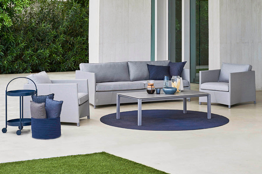 Diamond Outdoor Lounge Chair by Cane-Line, showing diamond outdoor lounge chairs in live shot.