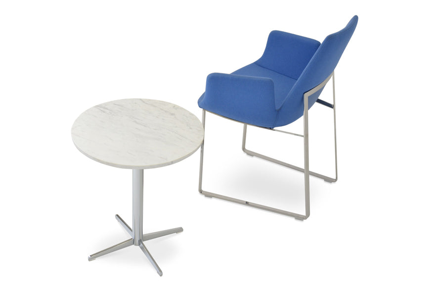 Diana End Table by SohoConcept, showing diana end table in chrome base & eiffel arm sled chair in skyblue camira wool.